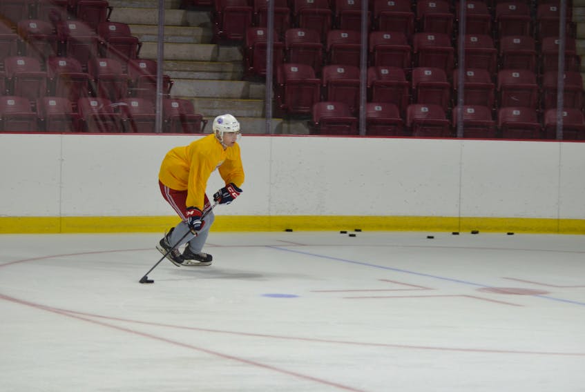 Summerside Western Capitals forward Riley MacDougall is about to release a shot during a practice at Eastlink Arena in Summerside on Tuesday night.