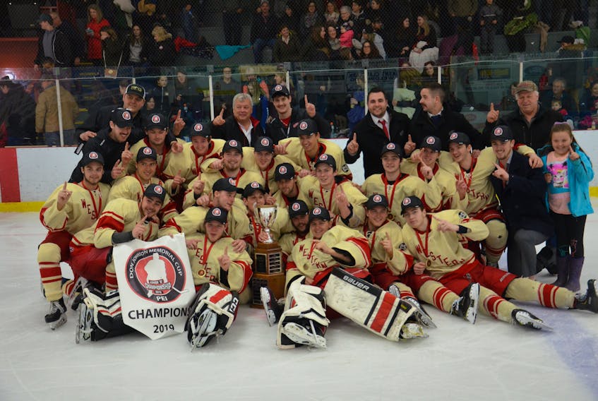 The Western Red Wings pose for a team photo after winning the 2019 Don Johnson Memorial Cup Atlantic junior B hockey championship in Kensington on Sunday afternoon. The Red Wings edged the host Kensington Vipers 4-3 in overtime in the final.