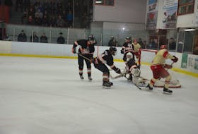 Western Red Wings forward Alex Morrissey scores the game-winning goal against the Sackville Blazers in a semifinal game at the 2019 Don Johnson Memorial Cup in Kensington on Saturday night. Morrissey scored on the Red Wings’ 61st shot of the game late in the first 20-minute overtime period. The Red Wings will meet the host Kensington Vipers in the gold-medal game of the Atlantic junior B hockey championship on Sunday afternoon.