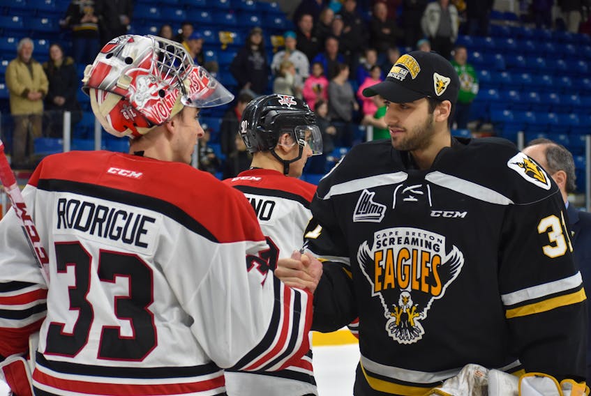 Kevin Mandolese, right, of the Cape Breton Screaming Eagles and Olivier Rodrigue of the Drummondville Voltigeurs shake hands following Game 5 of the Quebec Major Junior Hockey League first round playoff series between the Screaming Eagles and Voltigeurs at Centre 200 in Sydney. Both goaltenders are ranked No. 2 and No. 4 respectively among North American netminders for the 2018 NHL Entry Draft in June. Drummondville won the game 5-1 and the series 4-1 on Thursday.
