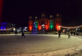 Skaters on the oval at Civic Square during its first night open. Ice usage is a little different this year because of COVID.