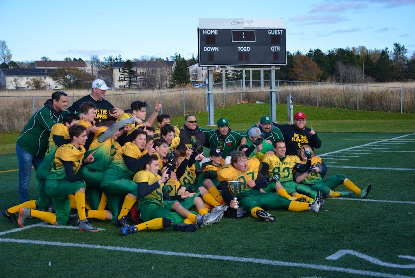 The Summerside Clippers celebrate after winning the 2019 Potato Bowl on Saturday afternoon. The Clippers captured the P.E.I. Varsity Tackle Football League championship with a 35-12 victory over the Cornwall Timberwolves at Eric Johnston Field in Summerside.