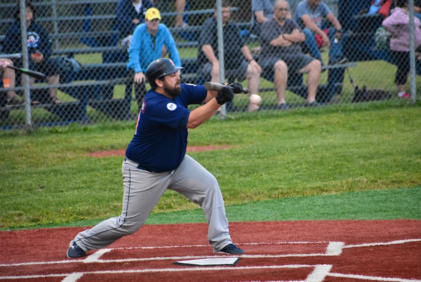 Justin Brewer of the Sydney Sooners bunts a Jeff Reeves pitch down the first base line during Nova Scotia Senior Baseball League action at the Susan McEachern Memorial Ball Park on Friday. Brewer, a North Sydney product, would reach first base on an error by Reeves. Sydney beat the Dartmouth Moosehead Dry 3-1 in the game.