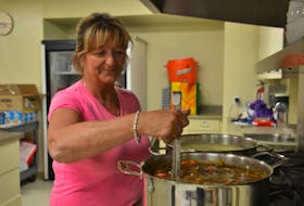 Tami MacIntyre prepares a pot of soup at the overflow shelter at Jack Blanchard Hall in Charlottetown on Saturday, before the brunt of hurricane Dorian hit P.E.I. Daniel Brown/The Guardian
