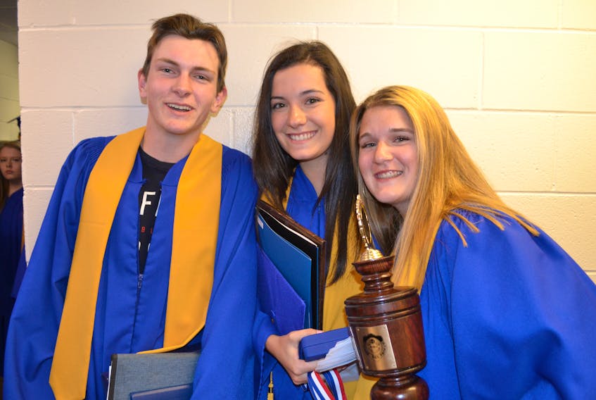 Members of the Westisle Composite High School Class of 2019, from left, Luke Dyment, valedictorian; Brynne Perry, Governor General's medal-winner, and class president Cailin Gaudet congratulate each other on a successful Grade 12 year.