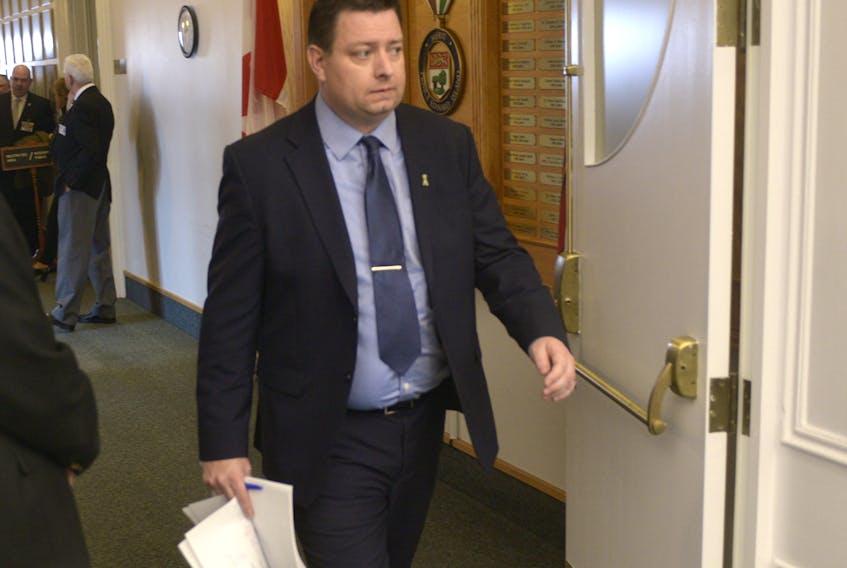 Kensington-Malpeque MLA Matthew MacKay walks into the floor of the legislature for question period on Wednesday.