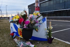 Tokens of appreciation were placed outside of RCMP detachments throughout the Annapolis Valley Monday following a horrific shooting spree that ended with police taking down the suspect at a gas station in Enfield Sunday. Photos by Ashley Thompson and Adrian Johnstone