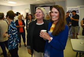 District 9 MLA Natalie Jamieson, right, and Finance Minister Darlene Compton watch the results roll in from Monday’s byelection. Jamieson took a commanding lead in the advance poll and ultimately won with 1,080 votes, with the closest runner-up being Green John Andrew with 709 votes.