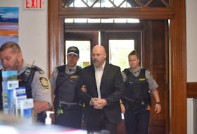 Ernie Ross (Junior) Duggan is seen being led into an elevator enroute to his appearance in Nova Scotia Supreme Court in Truro on Friday. Duggan pleaded guilty to second-degree murder in the Sept. 17, 2017 shooting death of his neighbour Susan Butlin. He is to be sentenced on Sept. 16.