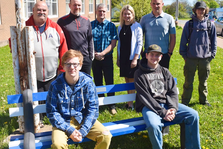 A bench built by students in the Alternative High School was unveiled at Trenton Middle School on Monday June 10. From left in back are: Kenny Arsenault, Colin Munro, Shaun MacDonald, Keah Callaghan, Russell Borden and Chris Sample. In front Tanner Murphy and Alan Pitts.