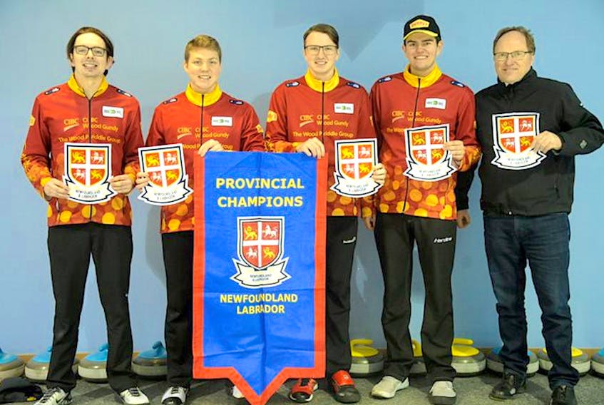 The Newfoundland and Labrador rink of (from left) slip Daniel Bruce, third Ryan McNeil Lamswood, second Joel Krats, lead Nathan King and coach Dennis Bruce, will finish with a medal at the Canadian junior men's curling championship in Langley, B.C., although the colour of the medal is still be determined. The rink finishes up championship pool today already knowing it will be three teams advancing to the medal round. — Submitted