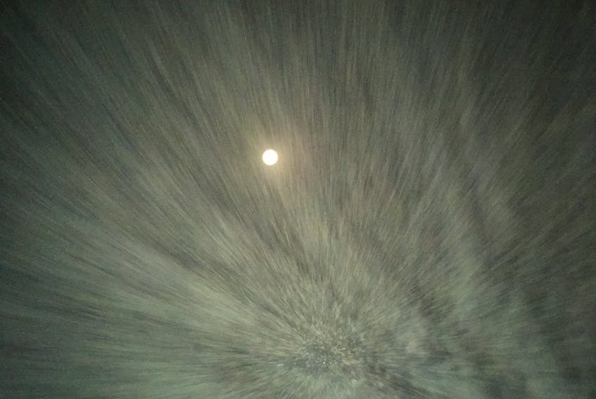 When Maryann Millet snapped this photo in Chester Grant, N.S. earlier this month, she expected to see the moon sitting on a fog bank.  Instead, she captured an artistic spray of water droplets; quite a unique perspective!