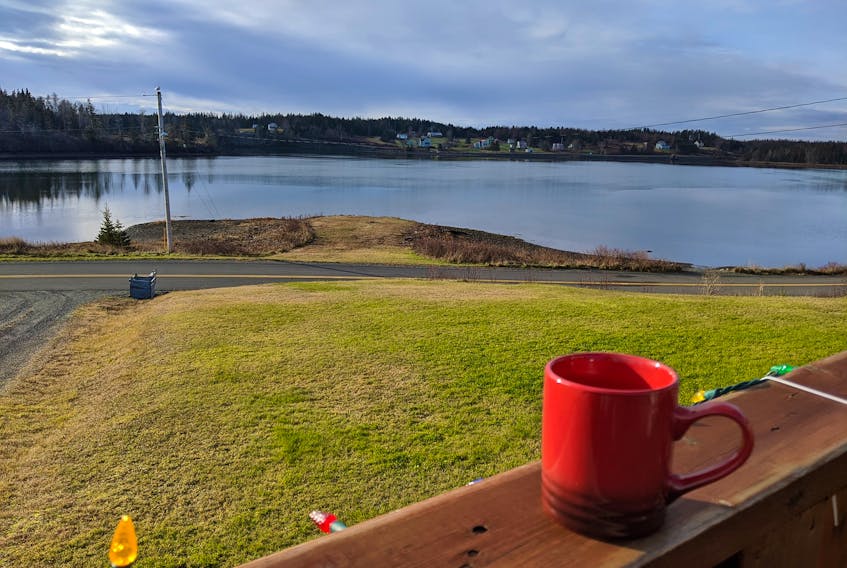 Tanya Burke took advantage of the milder than usual weather on Thursday and decided to have her morning coffee on her  River Bourgeois, N.S., deck.
