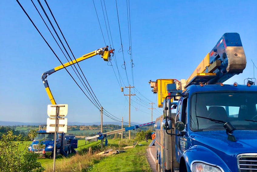 Maritime Electric crews work to restore power in the New Glasgow area Wednesday morning. - Maritime Electric Twitter photo