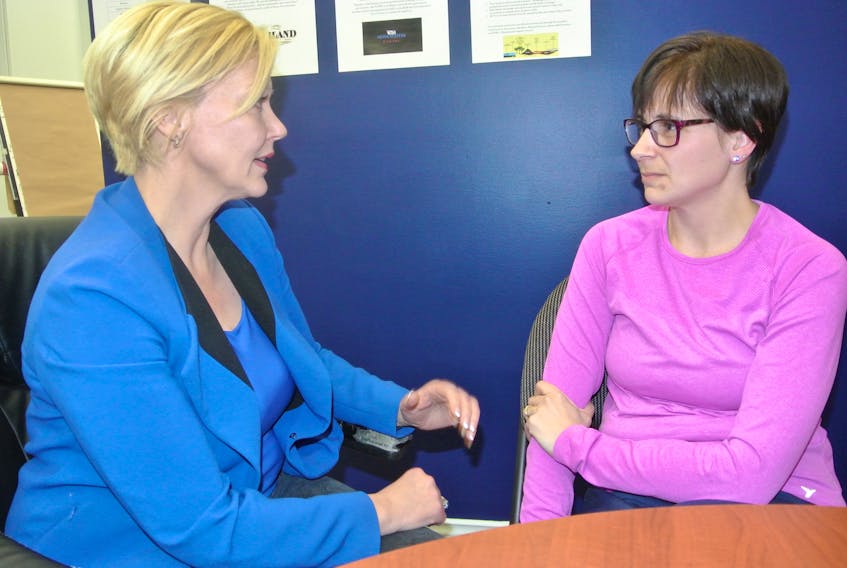 Desiray Dobson (right) talks to Cumberland North MLA Elizabeth Smith-McCrossin about her ongoing battle with mental illness and anorexia.