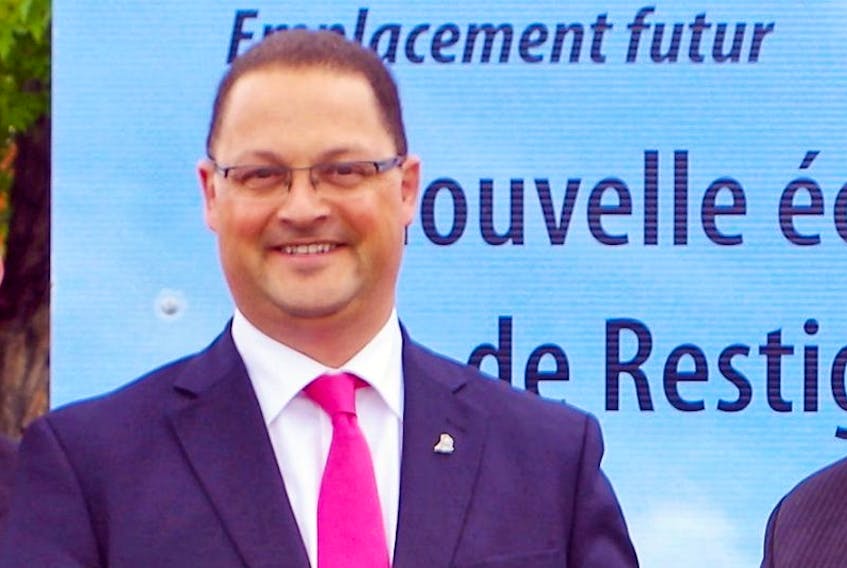 Minister Donald Arsenault