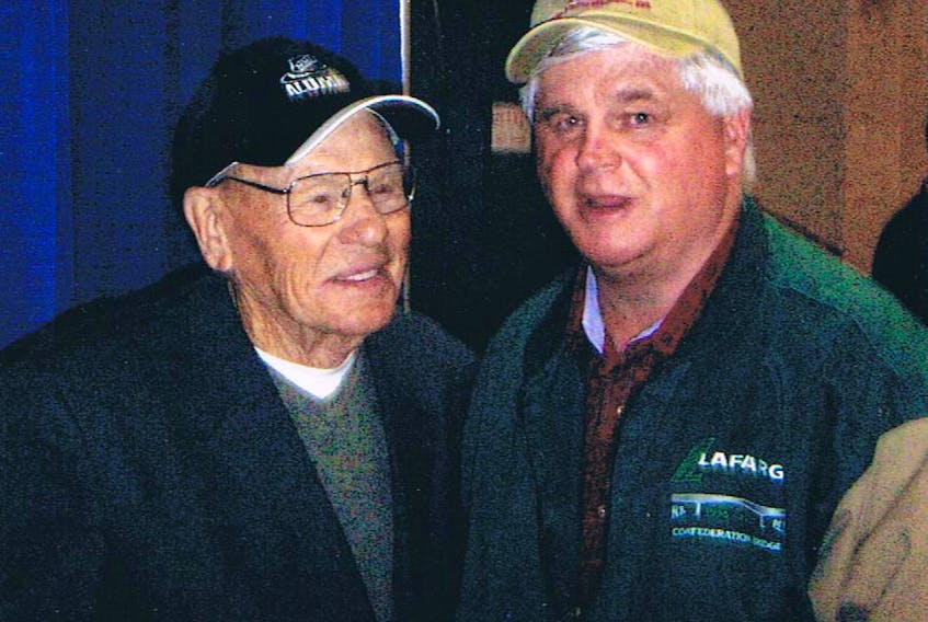 Toronto Maple Leafs goaltending great Johnny Bower, left and Tom Guinan are seen at the Halifax Forum in 2002.