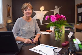 After 35 years as executive director of Big Brothers Big Sisters of Colchester, Michelle Misener has decided to retire. The carnations on her desk were given to her by agency volunteers and both current and former matches.