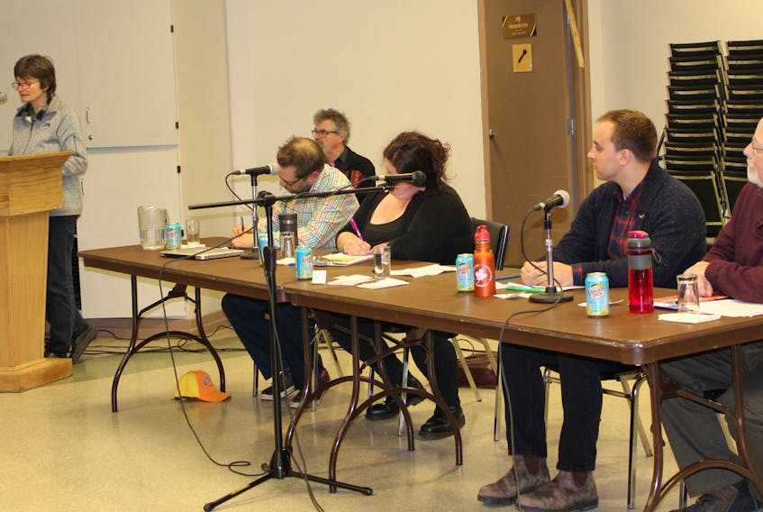 Candidate Sabine Dietz gives her opening statement at the all-candidates’ debate at the Tantramar civic centre while fellow contenders, from left, Brian Neilson, Julia Feltham, Dylan Wooley-Berry and Shawn Mesheau look on. The five Sackville residents are vying for a seat on town council in the upcoming municipal byelection.