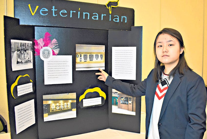 Vivian Xie, 13, is shown at the Atlantic Veterinary College booth at the convention. Guest speaker was Leo Bonnell, of Clarenville, N.L.  DESIREE ANSTEY/JOURNAL PIONEER