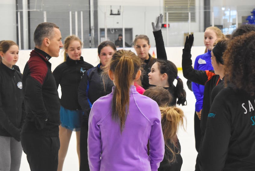 Elvis Stojko talks with some young skaters at the Pictou County Wellness Centre on March 9.
