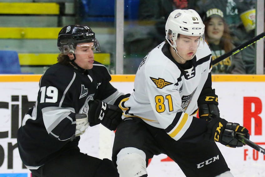 Cape Breton forward Mathias Laferriere, right, shown here keeping the puck away from Gatineau’s Kieran Craig, scored two goals to the lead the Eagles to a 4-1 victory over the Olympiques before a Centre 200 crowd of 2,705 on Saturday afternoon. The in-form St. Louis Blues prospect has 14 points in his past eight games.