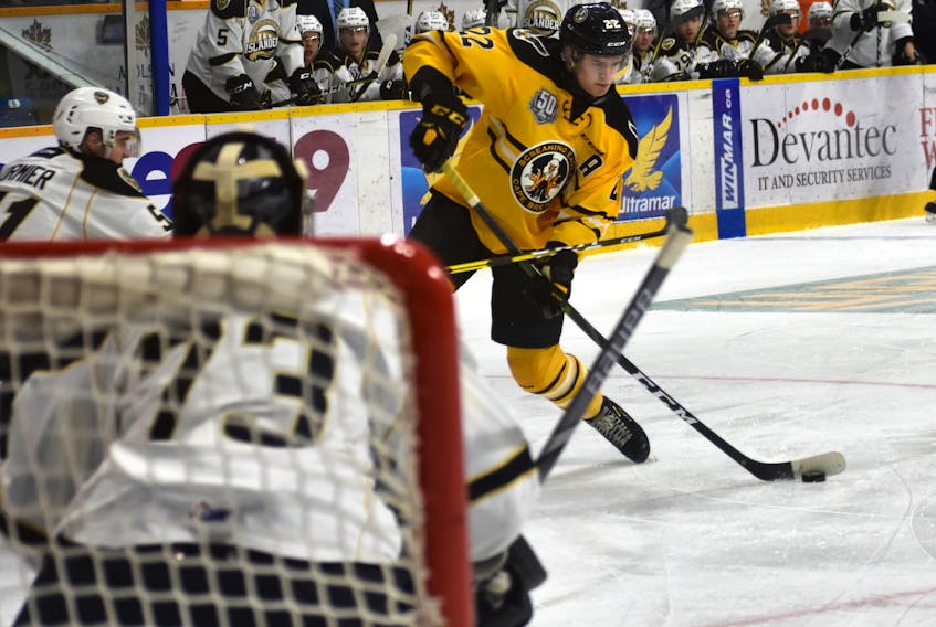 Mitchell Balmas of the Cape Breton Screaming Eagles prepares to fire a shot on Matthew Welsh of the Charlottetown Islanders during Quebec Major Junior Hockey League action at Centre 200 on Sydney. Charlottetown won the game 5-4 in a shootout.