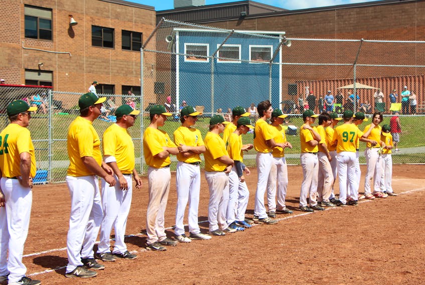 The Antigonish U-16 A's line up on the first-base line at the conclusion of their Sunday morning playoff game.