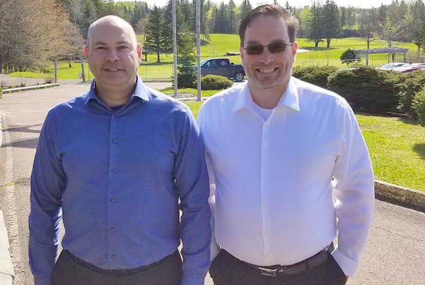 Chief marketing officer Pat Laderoute, left, and CEO Todd Chant are rolling out Easy Golf Tour's product, first in Canada and then in the United States.