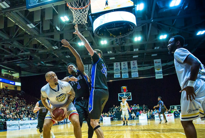 They are teams with vastly different records, but Ed Horton (8), Derek Hall (35) and the KW Titans have caused some problems for Grandy Glaze (left) and the St. John’s Edge this season. The teams meet tonight in Kitchener, Ont., where the Titans have won all three of their previous meetings. — 
St. John’s Edge photo/Jeff Parsons