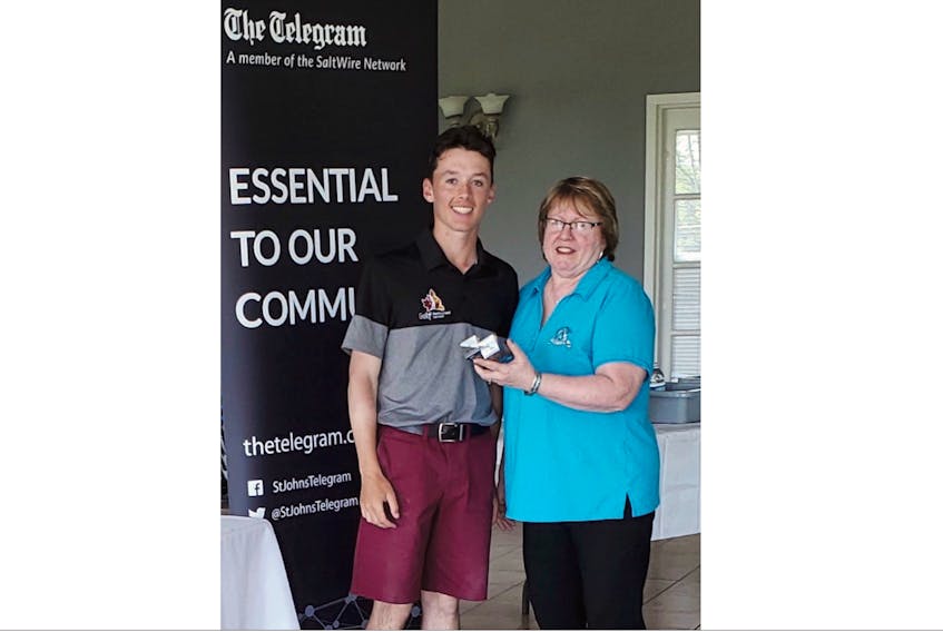 Ethan Efford is congratulated by Bernice McCarthy after he posted Monday’s best score at the Tely Tour stop in Grand Falls-Windsor. — Submitted