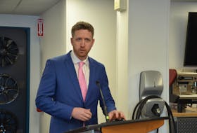 Premier Iain Rankin announces a $19-million investment to retrofit homes to make them more energy efficient and to encourage Nova Scotians to buy new or used electric vehicles at a Dartmouth electric vehicle dealership Wednesday, Feb. 24.