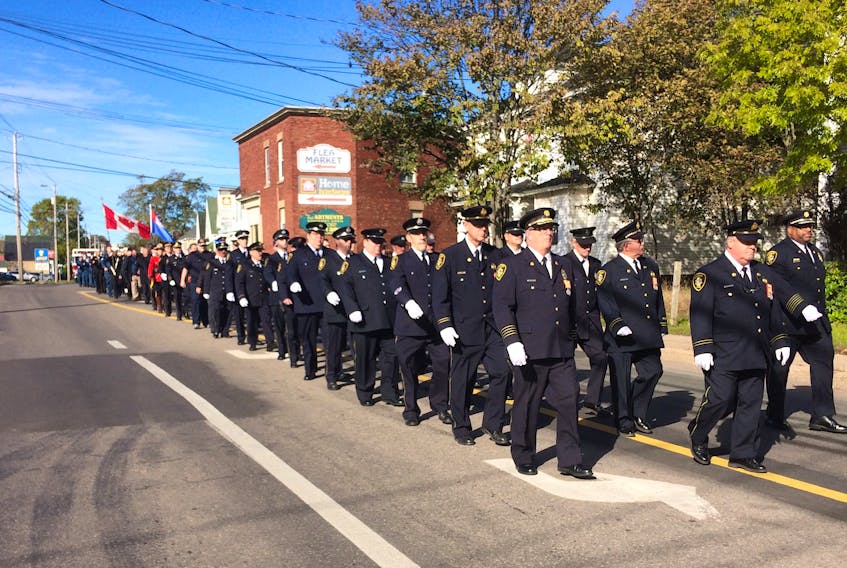 Members of the Amherst Fire Department were joined by other emergency personnel in participating in the 15th Emergency Responders Memorial Service in Amherst on Oct. 21.