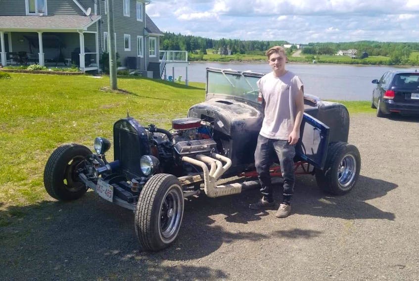 Broc McEachern stands next to the 1927 Ford Roadster that he’s restoring. The 17-year-old ARHS student has launched Engine for Hearts to raise money for the IWK Children’s Hospital in Halifax. McEachern, 17, was born with hypoplastic left heart syndrome and has been a frequent patient at the hospital.