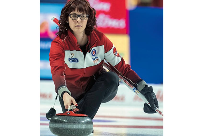 Newfoundland and Labrador skip Erica Curtis delivers a shot in a game against Yukon on Saturday, the opening day of play at the Scotties Tournament of Hearts in Moose Jaw, Sask. Newfoundland won the game 6-3, but lost 10-5 to Ontario Sunday — Curling Canada photo/Andrew Klaver