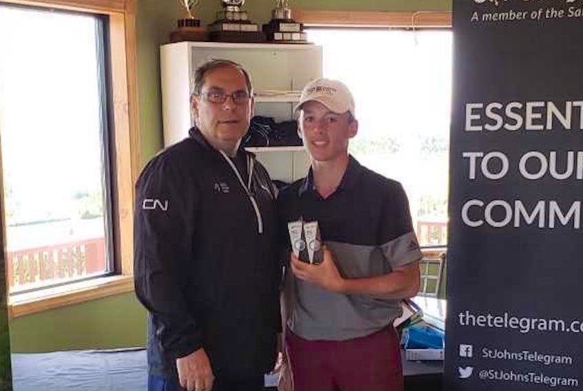 Ethan Efford, shown with Golf Newfoundland and Labrador Executive director Greg Hillier, had the best 18-hole score of the day Thursday at Pitchers Pond.