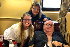Evan, Gretchen and Bruce Phinney are shown last year in Halifax. Evan and Gretchen are collecting blood donation pledges to honour Bruce's memory. He died on Christmas Day in 2019.