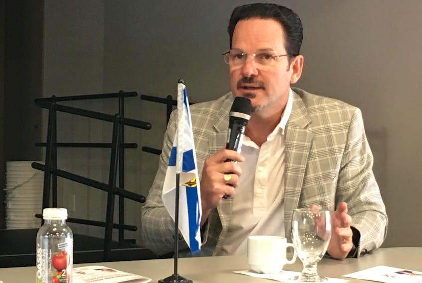Stephen Emmerson, president and CEO of Emmerson Packaging, speaks to a business audience during a panel discussion at the Community Credit Union Business Innovation Centre on Thursday.