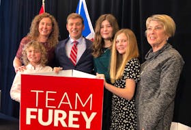 Liberal Leader Andrew Furey (third from left) celebrates his party's victory in the 2021 Newfoundland and Labrador election. With him are son Mark, his wife Dr. Allison Furey, daughters Maggie and Rachel, and his mother Karen Furey.