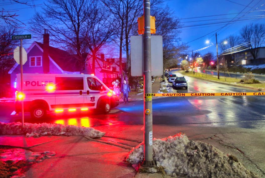 Halifax police block off the scene at the intersection of Connaught and Chisholm avenues early Monday morning after a late-night shooting sent a 32-year-old man to hospital with life-threatening injuries.