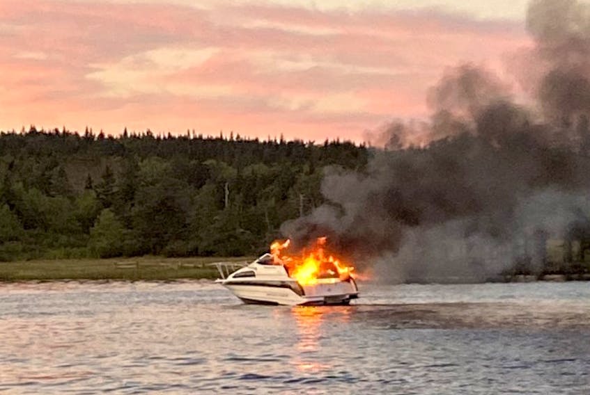 The Albert Bridge Volunteer Fire Department responded to a boat fire on the Mira River, just off Horne’s Road in Albert Bridge Thursday evening. The boat was fully engulfed in flames when the department arrived on scene. The lone occupant was able to get off the boat safely and no injuries were reported. PHOTO/KIM FERGUSON