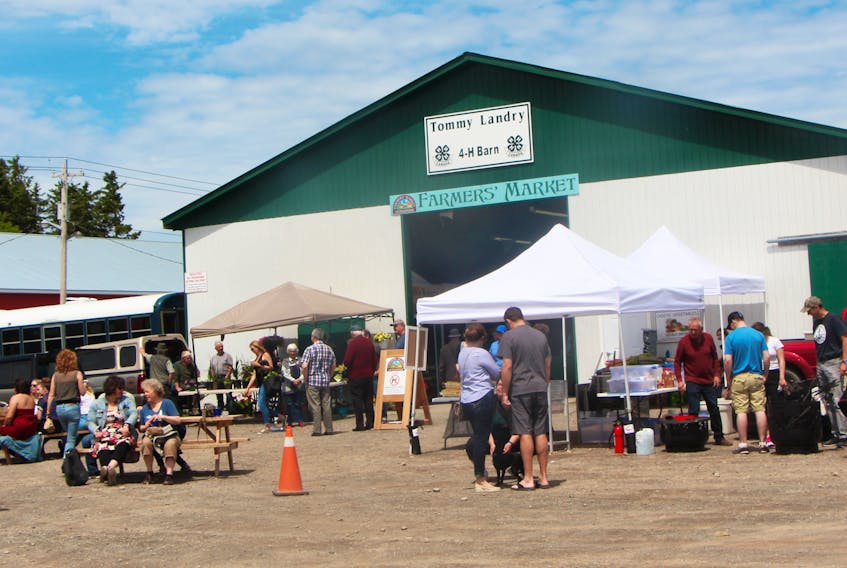 The bustling activity, at the June 16 Antigonish Farmers’ Market, will become a year-round sight once the new building is constructed. Richard MacKenzie