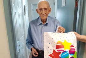 Ches Bull received a special package on his 100th birthday. - Photo Contributed.
