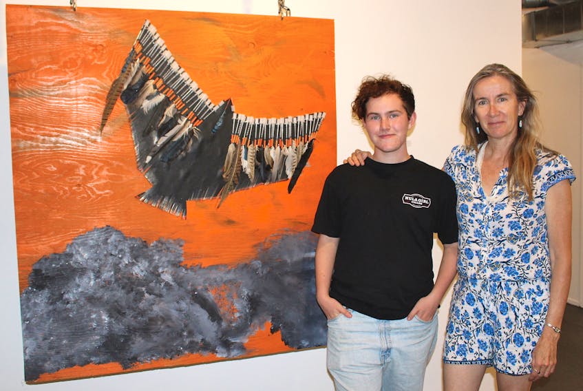 Fifteen-year-old Bliss Behar and his mom Meg Edwards collaborated on an art exhibit that is on display now at Struts Gallery at 7 Lorne Street in Sackville. This painting created by Bliss is made with the countless testosterone needles he has taken throughout the past couple of years.
