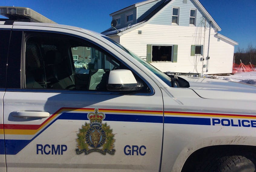 RCMP made a strong appearance outside a Beaton Lane home in Springhill March 21, following the discovering of two deceased persons inside by firefighters the previous day.
