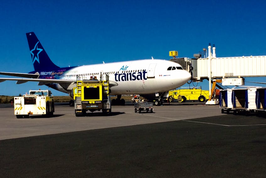 An Air Transat plane enroute from Barcelona to Montreal was diverted to St. John's airport Monday with fire crews on standby.
