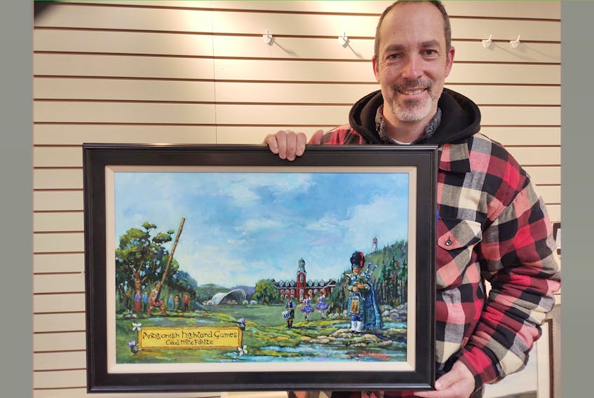 Artist Grant Lounsbury holds the painting commissioned by the Highland Society Board to mark 2020, the year the 157th Antigonish Highland Games were suspended due to Covid.