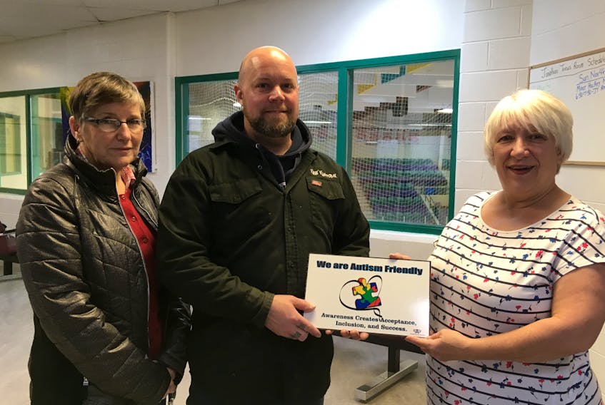 From left, Joan Chaissson of Autism Involves Me, Kris Bragg of Kris’ Kustoms and Wanda Merrigan, manager of the Bruce II Sports Complex celebrate the designation of the facility  being declared autism friendly.