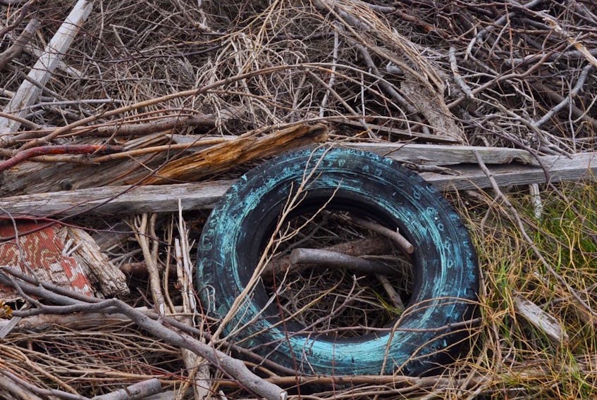 This tire at an illegal dumpsite near MacDougalls spoils the beautiful scenery of the Long Range Mountains.