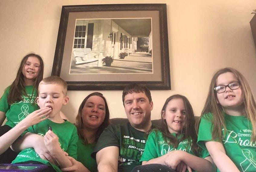 Connor with his family. Summer (Chris' daughter), Amanda Patey, Chris (Patey's boyfriend), Brooke (Chris' daughter), and Natalie (Connor's sister).